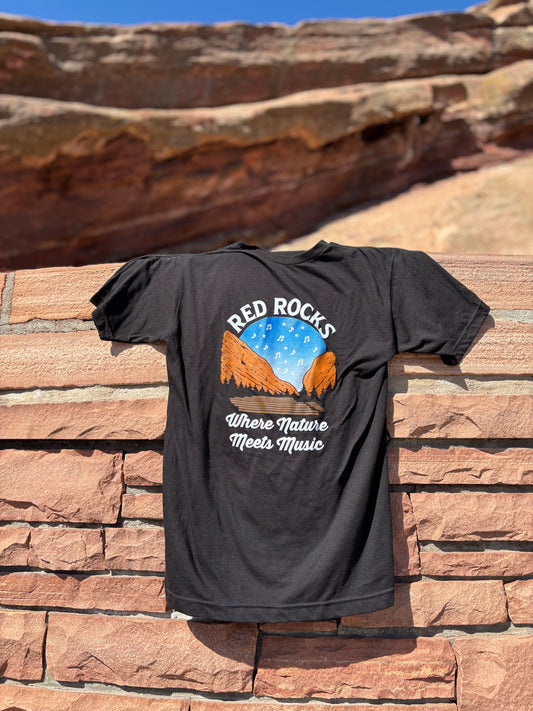 Black t-shirt with 'Red Rocks' graphic design on a stone wall background